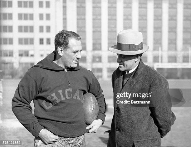 Red grange, backfield star , and George Halas, coach and onwer of the Chicago Bears, are discussing the strategy to be used in the coming...