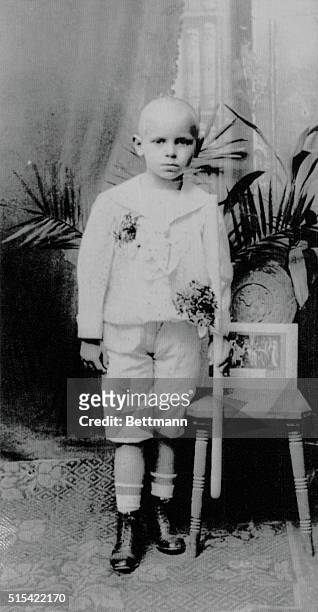 Undated-Krakow, Poland- A childhood picture of Pope John Paul II posing with a candle in his hand after receiving First Communion in his home...