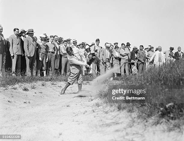 Gene Sarazen getting out of a sand trap during an Exhibition Match at Shorehaven Country Club.