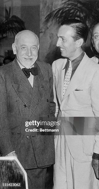 Luigi Pirandello, Italian playwright, winner of the Nobel Prize in Literature, is shown with Walter Disney , the creator of Mickey Mouse, the...