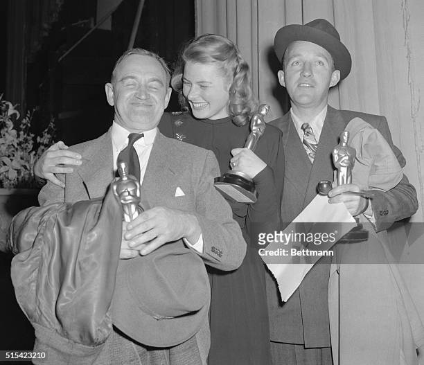 The Winners. Hollywood, Calif.: Barry Fitzgerald , Ingrid Bergman and Bing Crosby hold "Oscars" awarded them for outstanding performances in 1944....