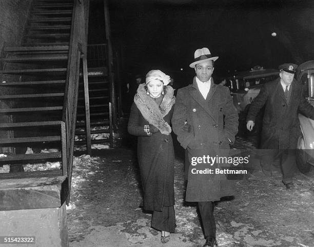 Miss Aggie Francis and her escort, Mr. Allen Mundy arrive at Club 66 for the exclusive Negro Ball.