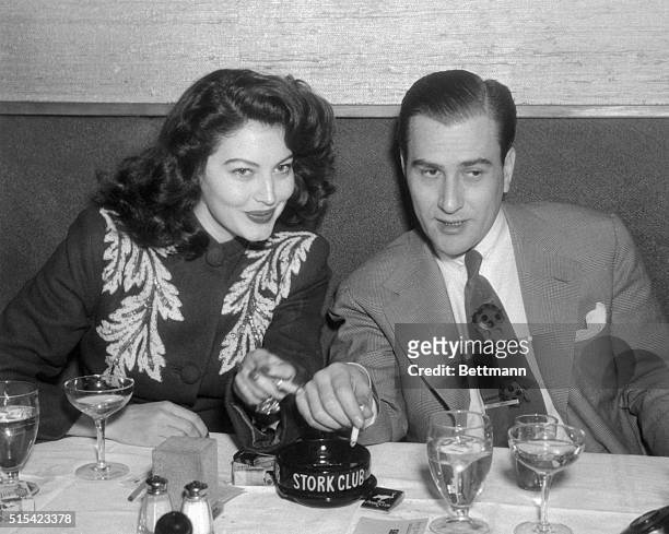 Orchestra leader Artie Shaw dines here at the New York's Stork Club with Mickey Rooney's ex, Ava Gardner.