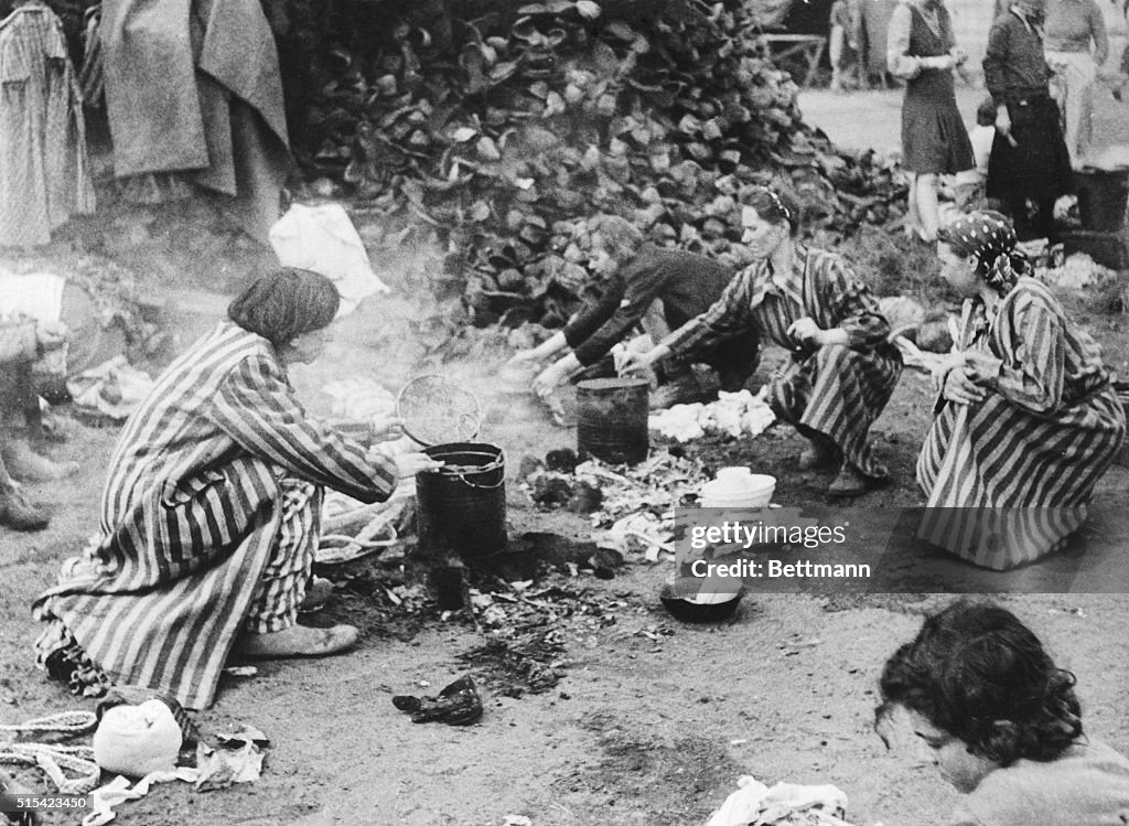 German Prisoners Kneeling on Ground at Belsen Concentration Camp