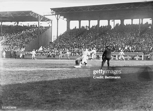 Fred Merkle of the Chicago Cubs is called out at third base during the 4th game of the 1918 World Series between the Chicago Cubs and the Boston Red...