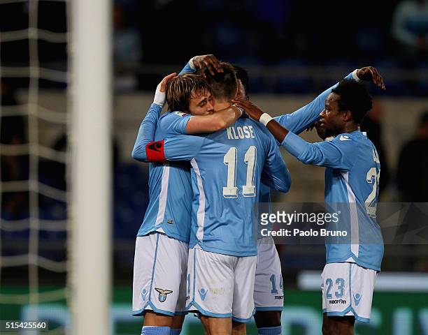 Miroslav Klose with his teammates of SS Lazio celebrates after scoring the opening goal during the Serie A match between SS Lazio and Atalanta BC at...
