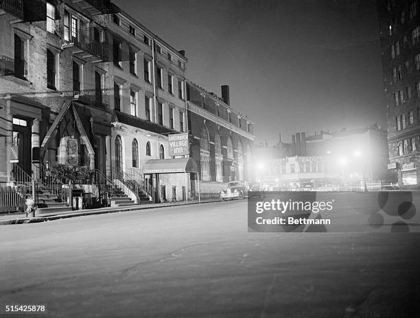 Entertainment ceases here with a view of Sheridan Square in Greenwich Village after 11:59 PM., the time set by emergency order for shutdown of all...