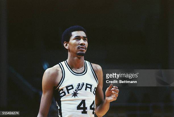 Portrait of George Gervin, guard for the San Antonio Spurs. Gervin, better known as "Iceman" lead the league in scoring four times and was elected...