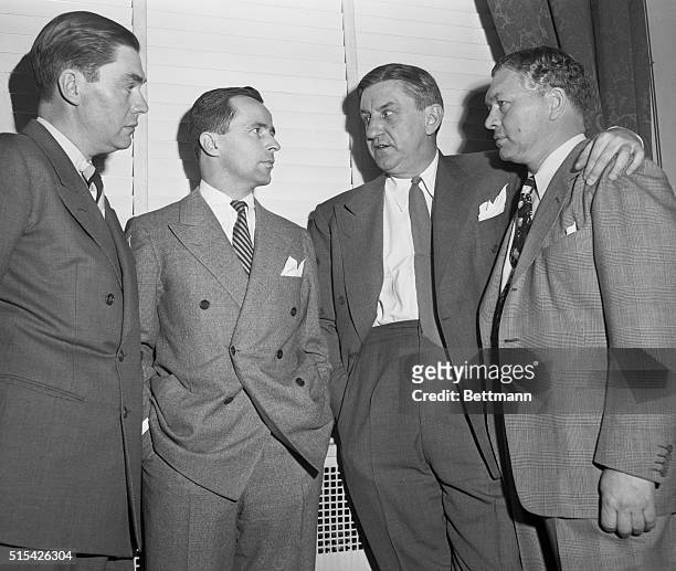 Left to right, John Mara, president of the New York Giants; Dan Reeves, owner of the Cleveland Rams; George Marshall, owner of the Washington...