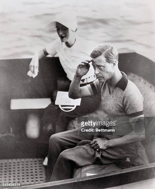 Camera Looks at a King. Trogio, Yugoslavia: King Edward VIII as he returned the salute of port officials at Trogio during his cruise along the...