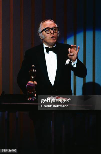 Hollywood, California: Director Richard Attenborough accepts his Best Picture Oscar for Gandhi at the 1982 Academy Awards ceremony.