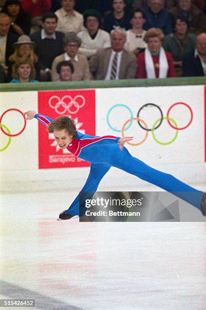 American Scott Hamilton in tight airborne-spin to win the Olympic gold medal in the figure skating event.