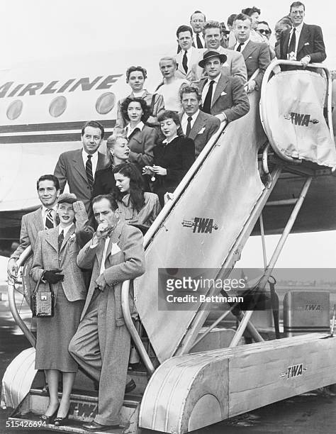 Film Stars Leave Communist Probe for Home. Queens, New York, New York: This group of Hollywood stars, who flew to Washington to protest the current...