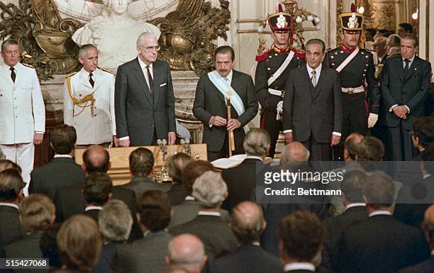 President of Argentina, Raul Alfonsin at his inauguration, Buenos Aires, Argentina, 11th December 1983. Next to him are outgoing President Reynaldo...