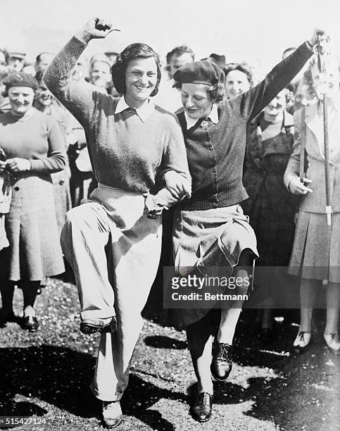Mrs. Babe Didrikson Zaharias , wearing her lucky slacks, and Miss Jean Donald, Scottish Champion, do a Highland Fling after their semi-final match in...