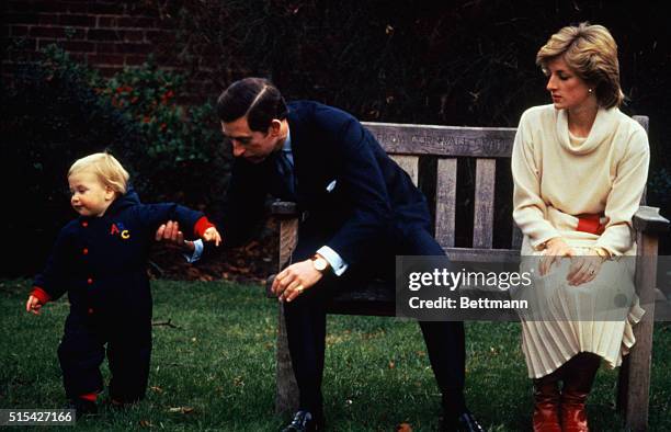 London, England: Prince William, 18 months next week, stands tall between his parents Prince and Princess of Wales 12/14, at a picture call before...