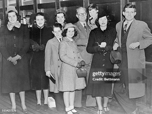 Joseph P. Kennedy, new United States Ambassador to Great Britain, is pictured here aboard the S.S. Manhattan with eight of his nine children who were...