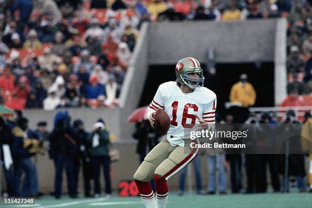 San Francisco 49ers' quarterback Joe Montana is shown running and deciding where to throw the football during a game with the Chicago Bears.