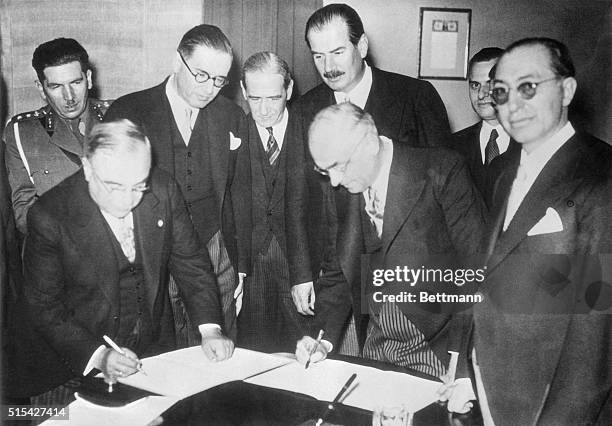 This photo shows Prime Minister of Greece General John Metaxas, and the Prime Minister of Turkey, Jelal Bayar, signing a treaty agreement in Athens....