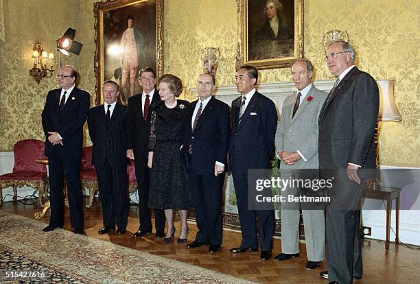 London, England- Economic Summit delegation heads inside 10 Downing Street, London for a working dinner. Italy's P.M. Bettino Craxi; EEC President...
