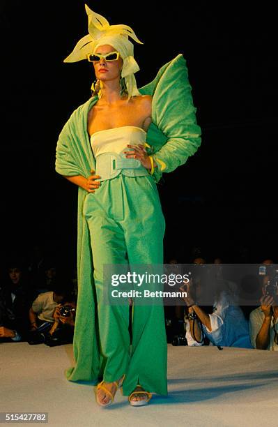 Model walking down the runway at the 1984 Claude Montana Ready to Wear show in Paris.