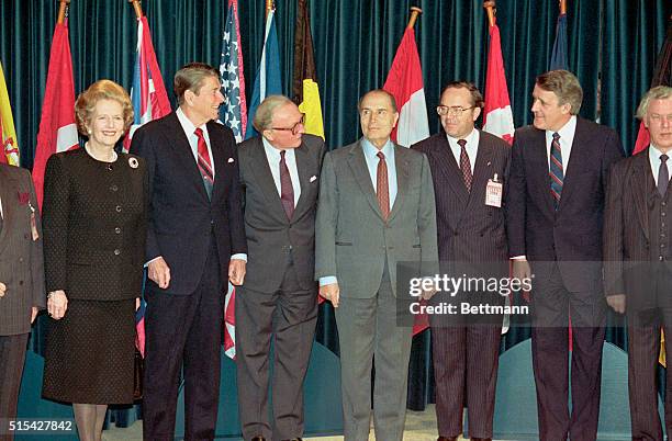 Left to right: British Prime Minister Margaret Thatcher, President Reagan, NATO Secretary General Lord Carrington, French President Francois...