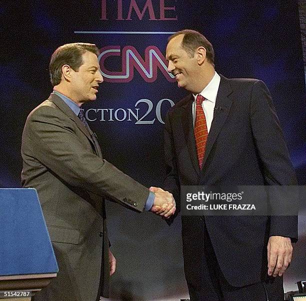 Democratic presidential hopefuls, US Vice President Al Gore and former US Senator Bill Bradley shake hands 21 February, 2000 at the Apollo Theater in...