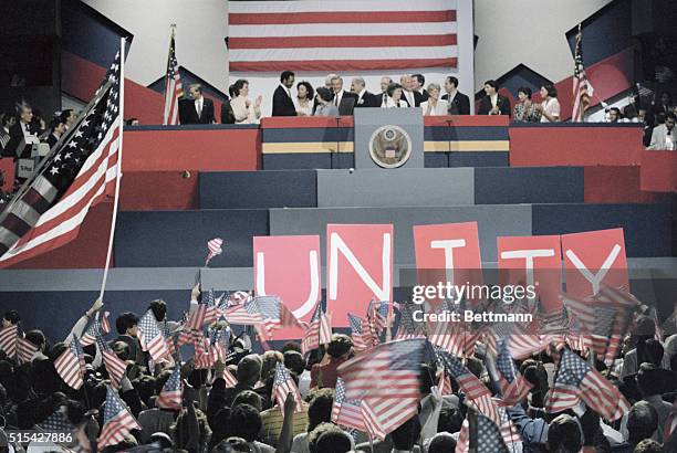 Democratic Party luminaries join the candidates at the podium at the close of the Democratic National Convention. Present are, among others; Jesse...