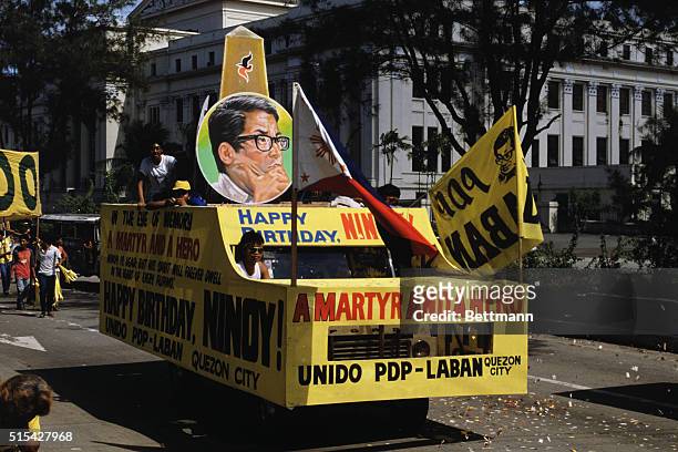 Manila, The Philippines: Some 10,000 Filipinos gather at the Luneta Park beside the seawall marking the 52nd birthday of slain opposition leader...