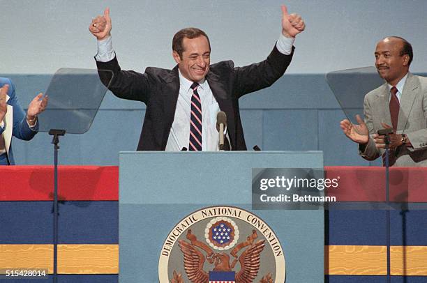 San Francisco: New York Governor Mario Cuomo delivers the keynote address to the Democratic National Convention, July 16th. Slide shows him raising...