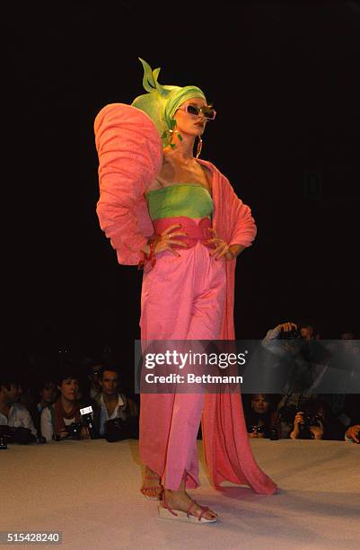 Model walking down the runway at the 1984 Claude Montana Ready to Wear show in Paris.