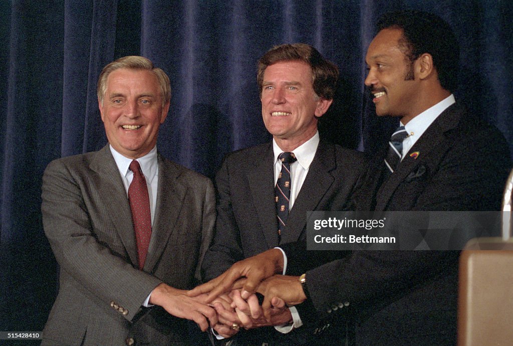 Walter Mondale, Jesse Jackson, and Gary Hart Shaking Hands