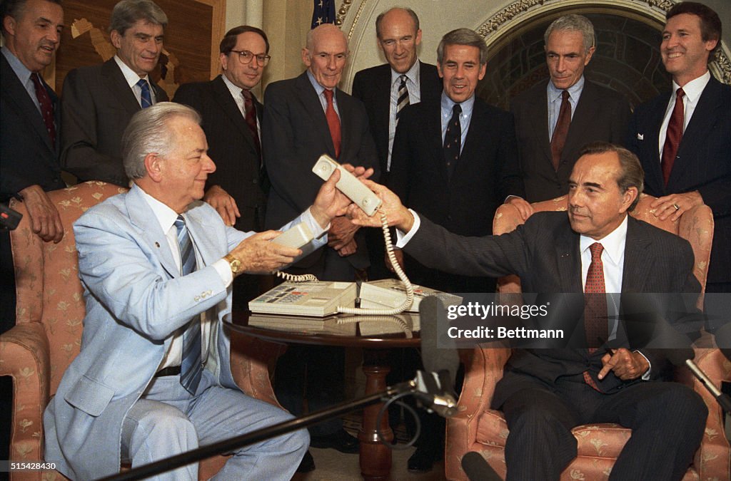 Robert Dole and Robert Byrd Using Telephone
