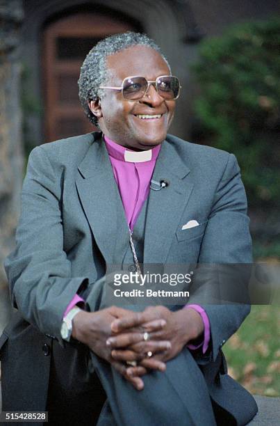 Anglican Bishop Desmond Mpilo Tutu smiles as he talks to press, October 16th, following his winning the Nobel Peace Prize for 1984.