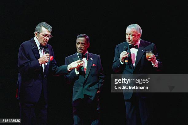 Cakland, California: Dean Martin , Sammy Davis, Jr. And Frank Sinatra perform to a sold out audience at the Oakland Coliseum late March 13th, the...