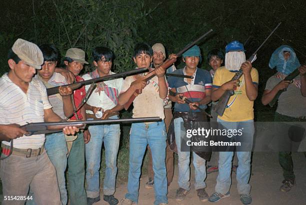 Ayacucho, Peru: Shining Path guerillas pose for reporters in a chance meeting in the Peruvian Andes, where terrorists are fighting government forces....