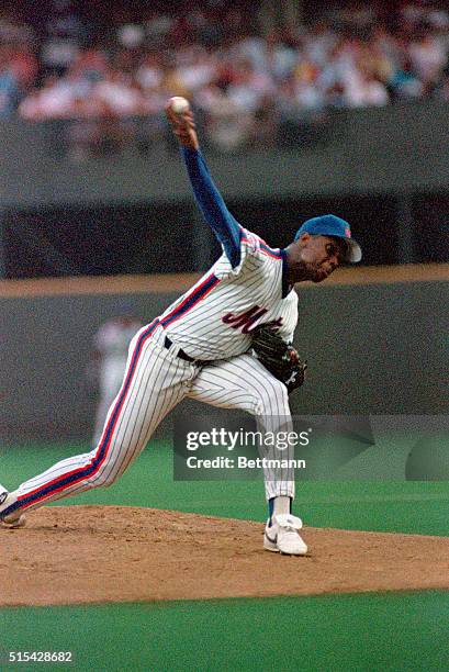 Cincinnati, Ohio: Mets' Dwight Gooden pitches at left, Twins' Frank Viola at right in All-Star game, July 12. Gooden gave up a home run in his three...