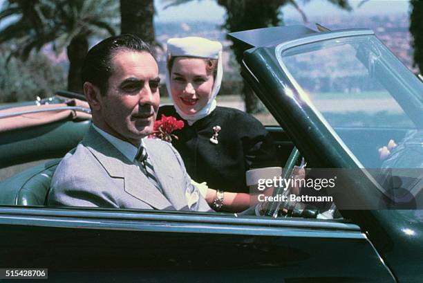 Tyrone Power and his wife Linda Christian are presently relaxing in Rome as guests visit in their villa here. This photo shows Tyrone and Linda in...