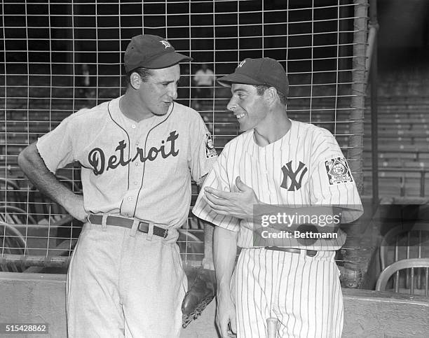 The fans and sports scribes all agree that Joe DiMaggio's one-handed stab of Hank Greenberg's 450 foot drive in the 9th was one of the greatest bits...