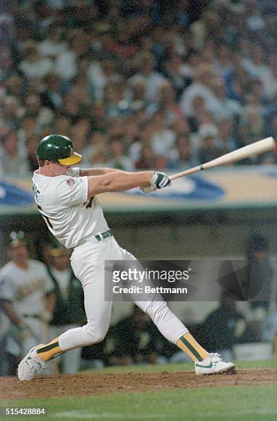 Oakland, California: Oakland's Mark McGwire hits home run in the bottom of the ninth inning to win the third game of the World Series against the Los...