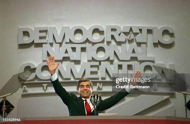 Democratic presidential candidate Governor Michael Dukakis acknowledges the applause of the delegates as he arrives to deliver his acceptance speech...
