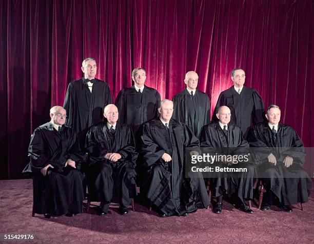 This is the first official photo of the U. S. Supreme Court Justices. From left to right and on the bottom row, is Justices Felix Frankfurter, Hugo...