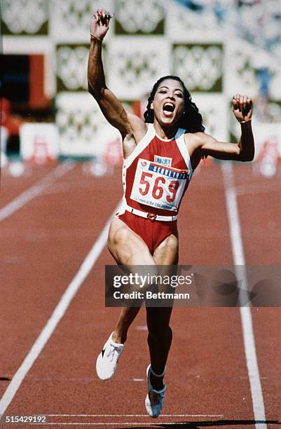 Florence Griffith-Joyner, United States Olympic Gold medalist winning 100 meter dash.
