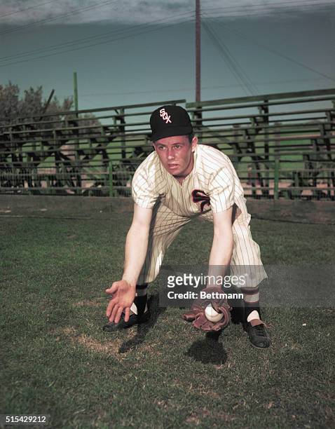Nelson "Nellie" Fox catching ground ball, in the uniform of the Chicago White Sox.