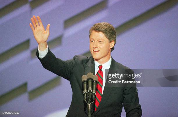 Atlanta, Georgia: Governor Bill Clinton of Arkansas places the name of Massachusetts governor Michael Dukakis in nomination for president at the...