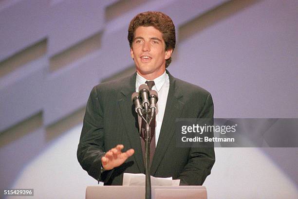 Atlanta: John F. Kennedy Jr., son of the late President Kennedy, snaps off a quick salute to the delegates at the Democratic National Convention....