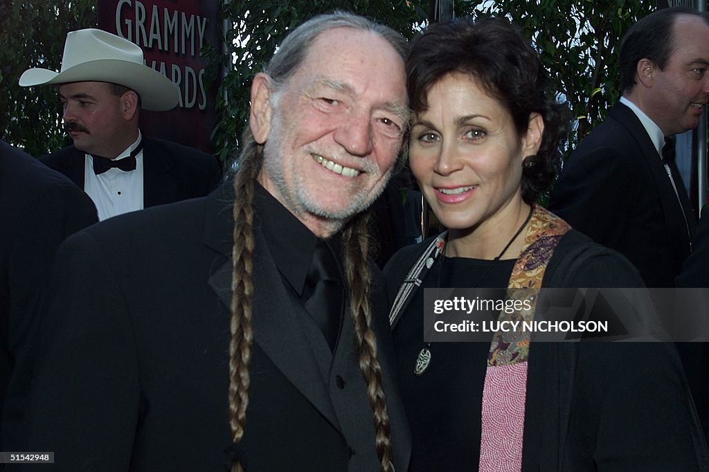 Country singer Willie Nelson (L) and his wife Anni