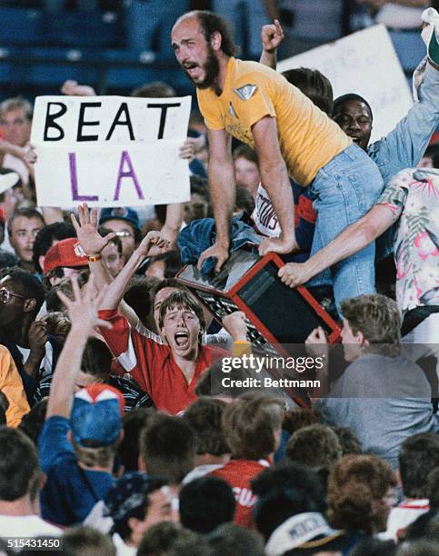 Pontiac, Michigan: Fans jump on the backboard after the Pistons defeated the Boston Celtics, 95-90, to win the Eastern Conference Championship, June...