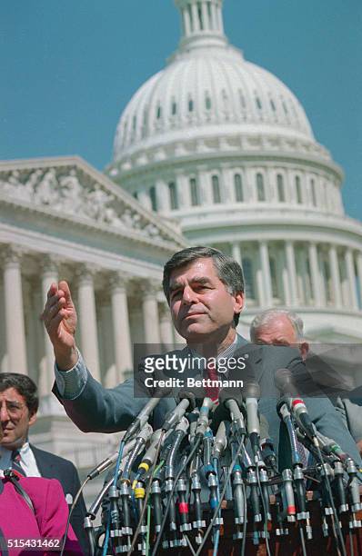 Visiting lawmakers on Capital Hill, Democratic presidential candidate Michael Dukakis offers a few remarks 5/12. Partially hidden him is house...