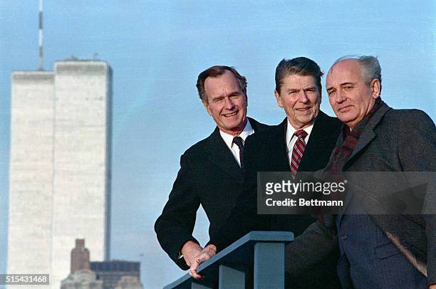 After a meeting in New York, President Ronald Reagan, Vice President George Herbert Walker Bush and Soviet General Secretary Mikhail Gorbachev pose...